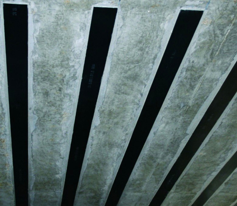 CFRP laminates bonded to a slab soffit